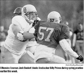 Offensive Lineman Josh Beckett blocks linebacker Billy Prince during spring practice.